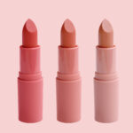 set of matte lipstick on a delicate pink background, red, raspbe | ASD Market Week